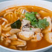 Udon Tom Yum · Yummy udon noodles and chicken in a classic Thai broth with straw mushrooms and seasoned wit...