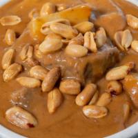 Massaman Curry · A native Thai recipe. This chef specialty curry cook with coco nut milk and various herbs an...