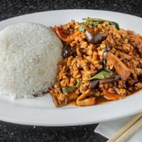 Spicy Basil Leaves With Ground Chicken · A famous dish in Thailand. This dish consists stir-fried ground chicken, straw mushrooms, ca...