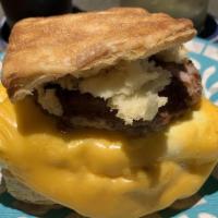 Sausage, Egg And Cheese Biscuit Sandwich · The newest favorite! folded egg, American cheese, and Catalpa Grove Farms breakfast sausage.