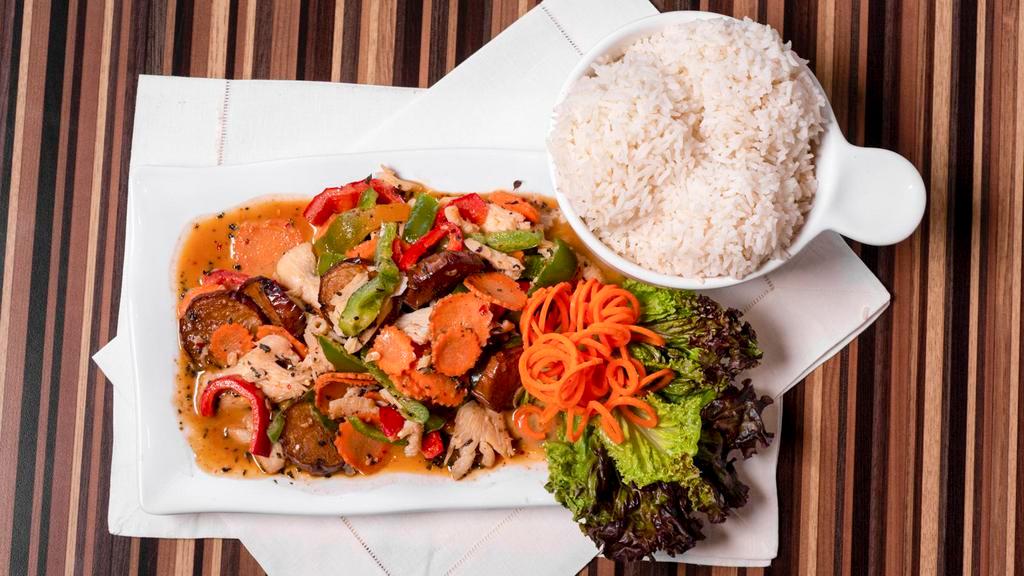 Gang Panang · Basil, bell peppers, carrots and eggplants sautéed in coconut panang curry.