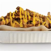 Jalapeño Cheese Hand-Cut Fries. · Smothered with jalapeno cheese sauce