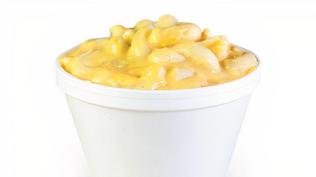 Mac & Cheese. · Pasta with our smooth and creamy cheese sauce