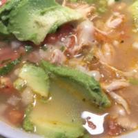 Chicken Soup · With chicken, rice, avocado, pico de gallo and shredded cheese.