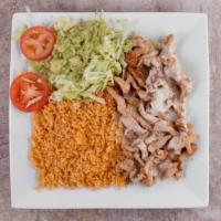 Arroz Con Pollo · Grilled chicken and rice topped with cheese sauce. Served with tortillas.