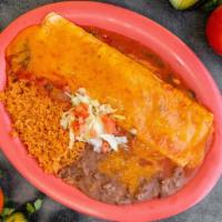 Burrito Mojado/Wet Burrito · burrito filed with beans your choice of meat onions cilantro topped with tomatoes home made ...