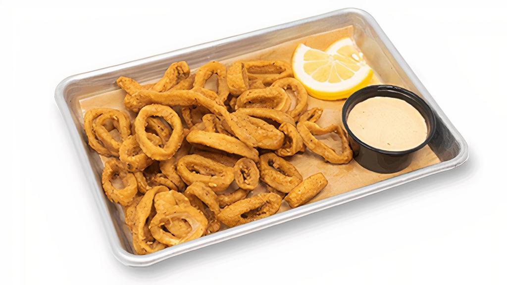 Calamari Appetizer · Lightly tossed in our house-made breading,. fried light & crisp, chipotle ranch.