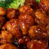 左 宗 鸡 / General Tao'S Chicken · Sweet deep-fried chicken served with broccoli.
辣的 / Spicy.