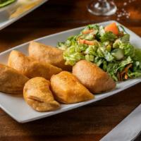 Empanada Combination Plate · 6 sampling of our beef, chicken, and cheese empanadas.