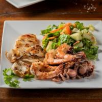 Frutos Del Mar (For Two) · Combination of char-grilled shrimp, calamari and baby octopus lightly marinated in a garlic-...