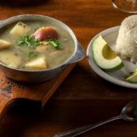 Sopa De Platano · Vegetarian. Served with rice and avocado. Traditional colombian green plantain soup with pea...