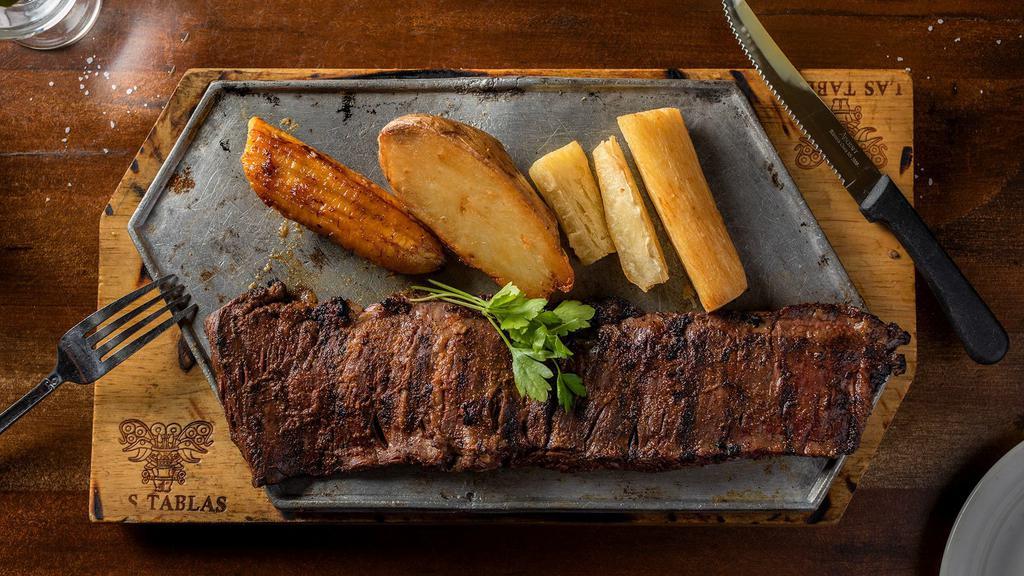 Entraña (Specialty Of The House) · Tender, juicy, and flavorful char-broiled skirt steak.