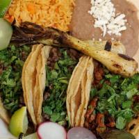 Taco Dinner · 3 tacos with your choice of meat, rice and beans