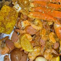 C1 · One-half pound snow crab legs, one-half pound shrimp (no head),  one-half pound  all-meat sa...