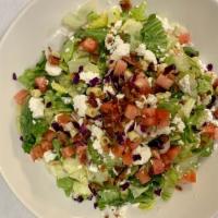 Chopped Salad · Chopped chicken, lettuce, applewood smoked bacon, ditalini pasta, diced tomatoes, cucumbers,...