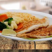 Fish Fillet / Filete De Pescado · Served with rice and vegetables. / Servido con arroz y vegetales.