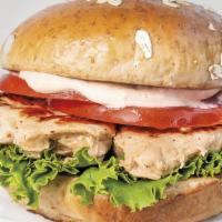Grilled Chicken · The lighter chicken sandwich. Grilled Chicken Breast, Rooster Sauce, Lettuce, Tomato, Premiu...