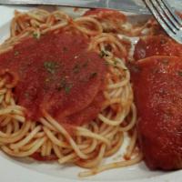 Chicken Parmesan · Served with a side of spaghetti.