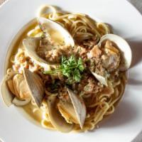 Linguini With Clam Sauce · Baby clams and minced clams, sauteed in olive oil, fresh garlic and wine sauce, over linguini.