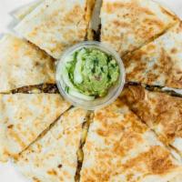 Quesadilla · On large flour tortilla with melted cheese.