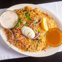 Indian Spice Spl Chicken Biryani · Basmati rice cooked with tender pieces of boneless chicken, blended with herbs and spice gar...