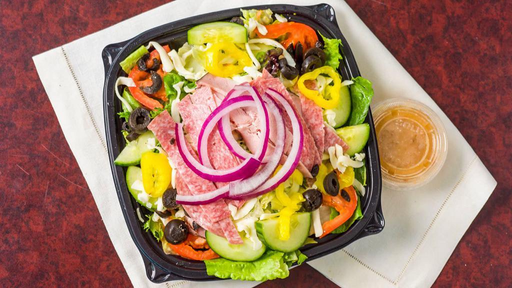 Antipasto Salad · Mixed Lettuce, Fresh Tomatoes, Cheese, Onions, Ham, Salami, Ripened Olives, Cucumbers, Hot Pepper Rings, and Dressing.