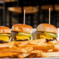 Classic Sliders · American cheese, pickles, toasted brioche.

Burgers and egg items are cooked to order. Consu...