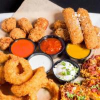 The Point Sampler · A selection of our favorite appetizers - cheese sticks, onion rings, chicken bites and potat...