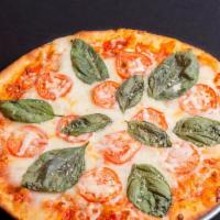 Margherita · Vegetarian. House-made San Marzano tomato sauce, fresh mozzarella, roma tomatoes, basil leav...