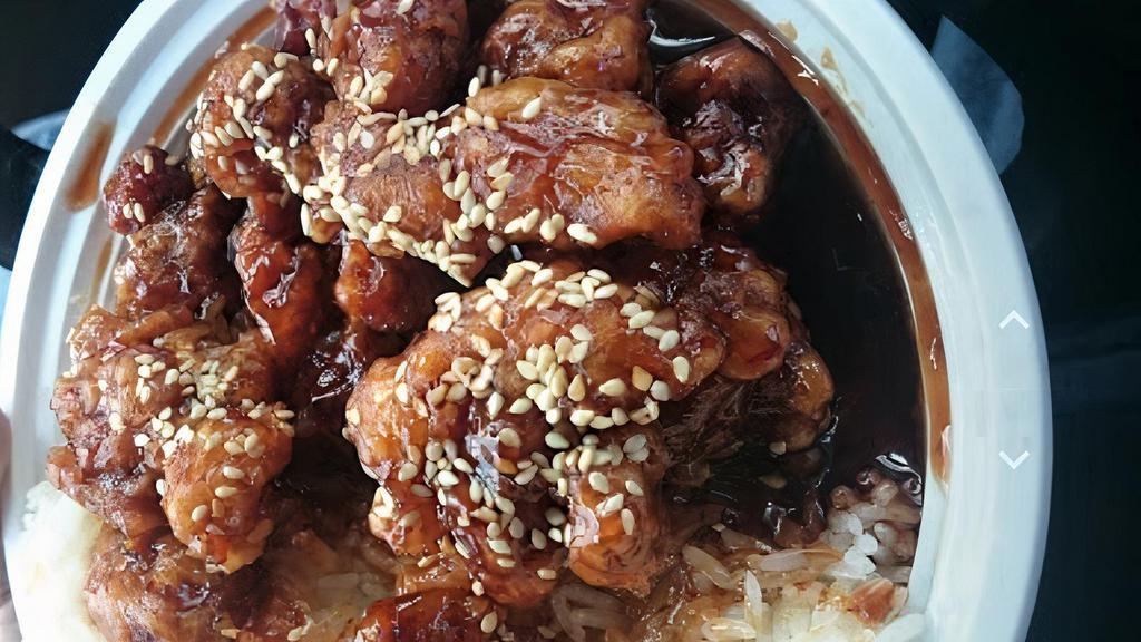 Sesame Chicken · Spicy. Tender chunk of chicken deep fried till crispy with sesame seeds on top of chicken in special hot and sweet sauce served on top of broccoli.