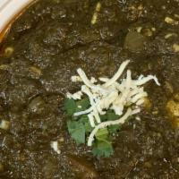 Palak Paneer · Fresh homemade cottage cheese cooked in spinach.