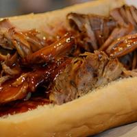 Pulled Pork Sandwich · Fresh pulled bbq pork on French bread, served with coleslaw or baked beans.