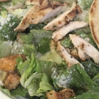 Caesar Salad · Crispy romaine lettuce with Caesar dressing, croutons and Parmesan cheese. Try it with chick...
