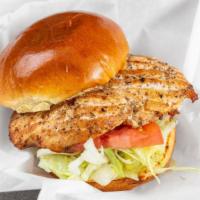 Grilled Chicken Breast Sandwich · Choice of toasted bun or pita with lettuce, tomato and choice of BBQ sauce or mayo. Try it w...