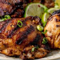 Jerk Chicken Lunch Special · Small lunch size portion of Jerk chicken, rice and peas and house-blend sauteed vegetables (...