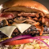 Lubeburger® · Topped with sautéed mushrooms, crispy bacon, our signature Hot sauce, melted American cheese...