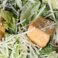 Chicken Caesar Salad · Chopped romaine lettuce, tossed in traditional Caesar dressing, croutons and shredded Parmes...