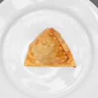 Samosas · Vegetarian. Handmade deep-fried pastry pocket filled with vegetables. Served with chutney.