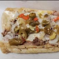 Garlic Cheezy Beef · Our italian beef piled onto fresh baked garlic bread, covered with mozzarella cheese and toa...