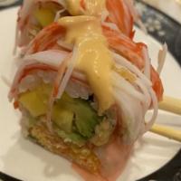 Omaha Roll · Spicy lobster, cucumber, avocado mango soy paper crab on top.