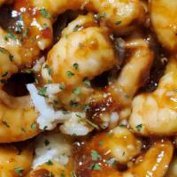 Sweet N Spicy Shrimp · 25 Sweet n spicy peeled shrimp served with  white rice and loaded potatoes