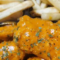 Hot Wings · 10 wingettes tossed in buffalo wing sauce and served with fries