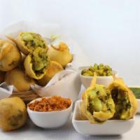 Bengaluru Bonda · Deep fried savory appetizer made with spicy potato mix.