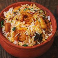 Konaseema Royyala Biryani (Shrimp Special) · Special shrimp cooked with basmati rice and homemade biryani masala.