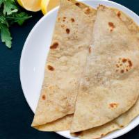Chapati · Thin wheat flour bread.