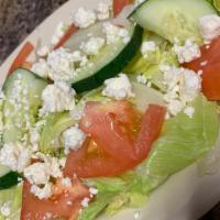 Greek Salad · lettuce, tomatoes, feta, special dressing.
