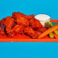 Buffalo Wings · Six crispy buffalo wings served with blue cheese and celery.