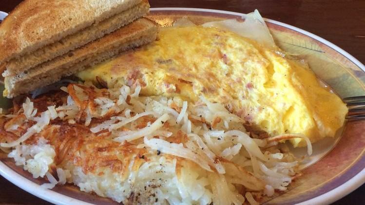 Farmers Omelette · Virginia ham, American cheese, hash browns and sauteed onions