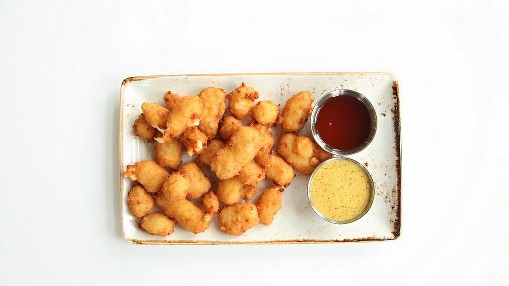Wisconsin White Cheddar Cheese Curds · wisconsin white cheddar / lightly breaded / fried crispy / house beer mustard / hot honey