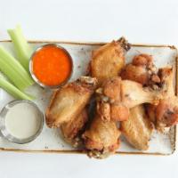 Wings · fresh & crispy fried wings / tossed in your choice of sauce / served with celery & bleu chee...